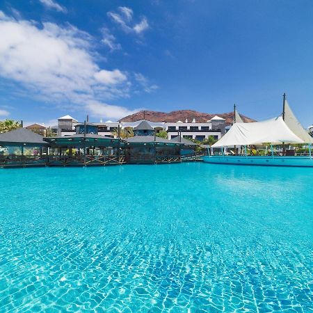 H10 Rubicon Horizons Collection (Adults Only) Hotel Playa Blanca  Bagian luar foto The resort's lagoon pool