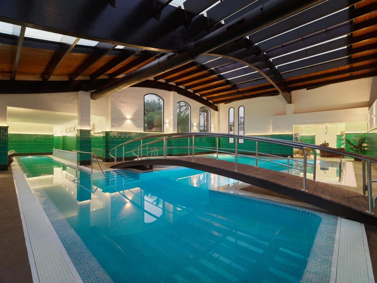 H10 Rubicon Horizons Collection (Adults Only) Hotel Playa Blanca  Bagian luar foto The swimming pool at the hotel